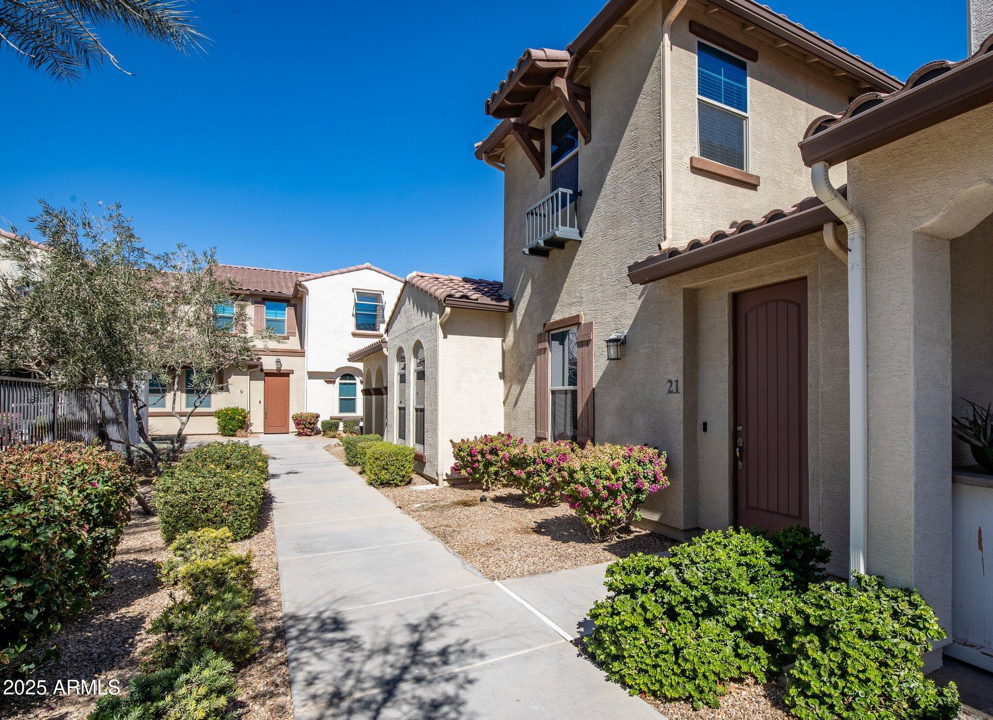 3855 South McQueen Road, Unit 21 Chandler, AZ 85286 - Photo 1 of 35 a view of a house with a street