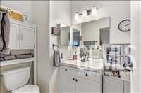 Undisclosed Address Tehachapi, CA 93561 - Photo 17 of 28 a bathroom with a granite countertop sink vanity mirror and toilet
