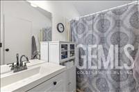 Undisclosed Address Tehachapi, CA 93561 - Photo 18 of 28 a bathroom with a sink and a mirror