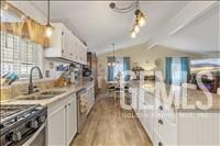 Undisclosed Address Tehachapi, CA 93561 - Photo 9 of 28 a kitchen with lots of counter top space