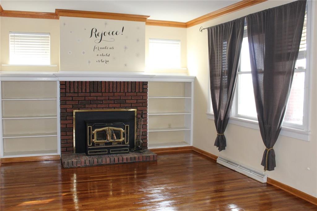 184 Richbarn Road Pittsburgh, PA 15212 - Photo 2 of 16 As you enter this home the gleaming hardwood floors invite you into the spacious living room to relax by the fireplace.
