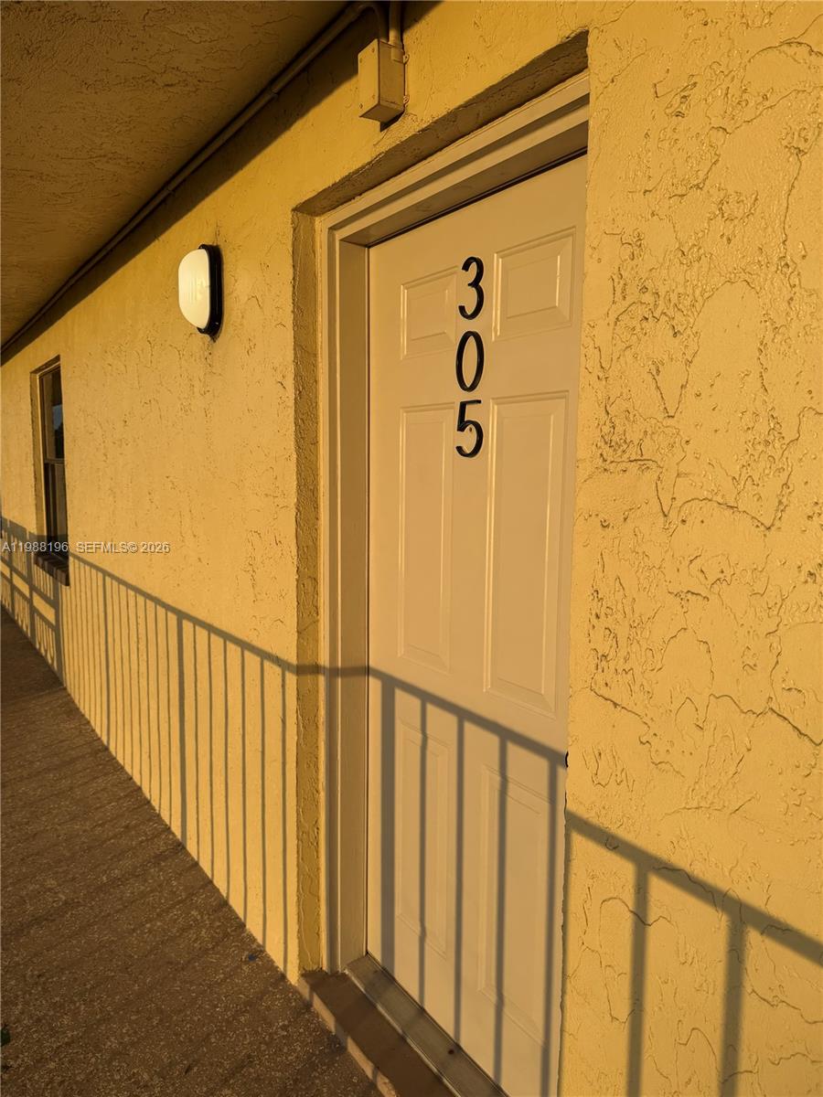 9355 Southwest 8th Street, Unit 305 Boca Raton, FL 33428 - Photo 10 of 12 a view of a door