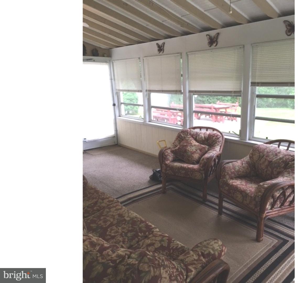 316 Rolling Creek Road Swarthmore, PA 19081 - Photo 8 of 10 Enclosed Porch