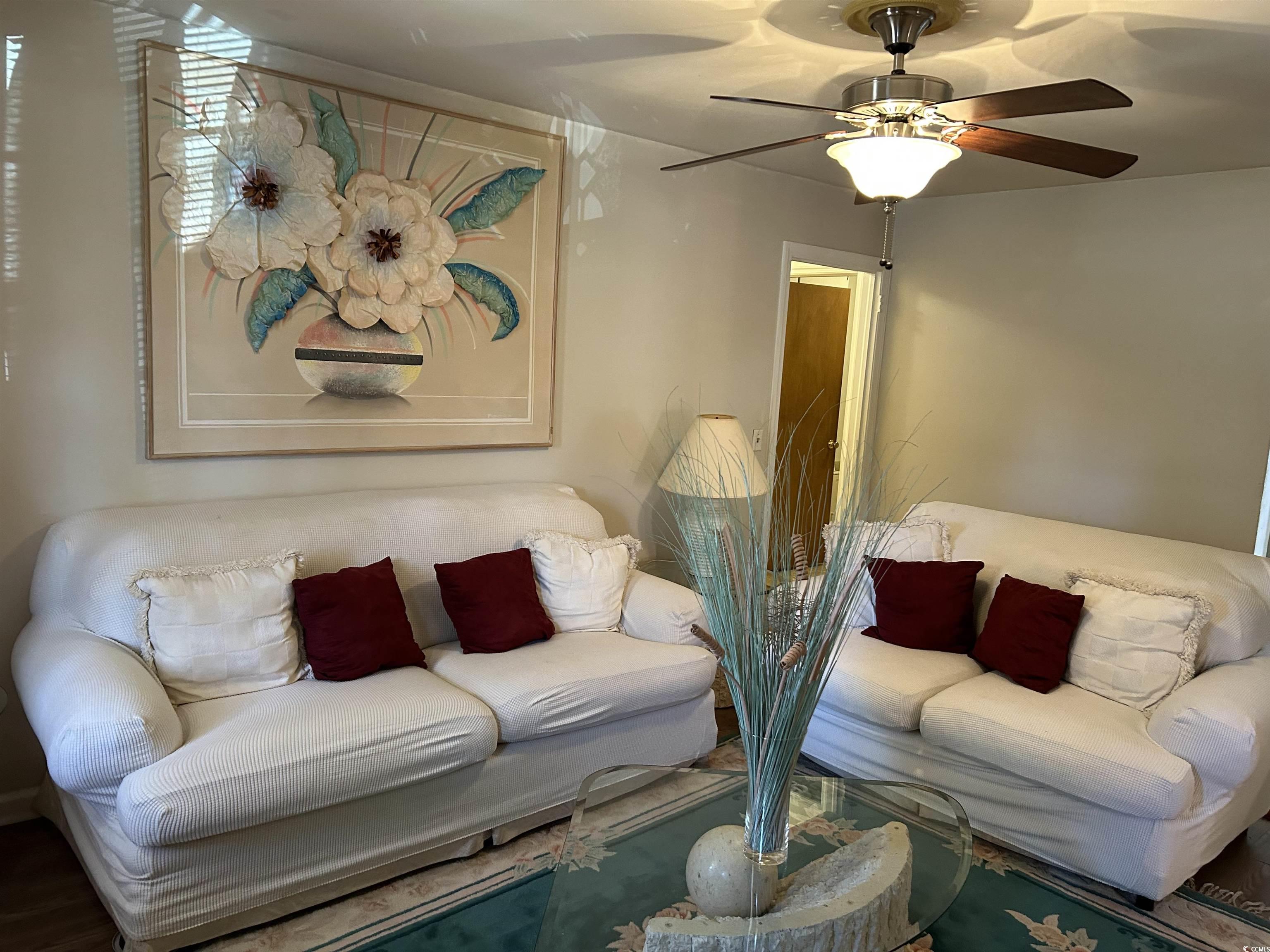 1411 East Harrison Street Dillon, SC 29536 - Photo 5 of 40 Living room featuring a ceiling fan