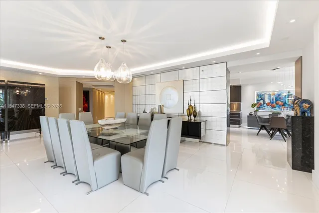 a kitchen with stainless steel appliances kitchen island granite countertop a sink and counter space
