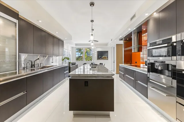a kitchen with a table and chairs
