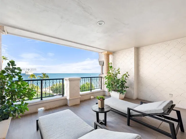 a bathroom with a shower sink and mirror