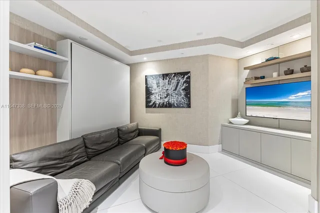 a bathroom with a double vanity sink toilet mirror and bathtub
