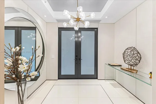 a view of a hallway with wooden shelves