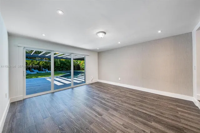 a view of a backyard of the house