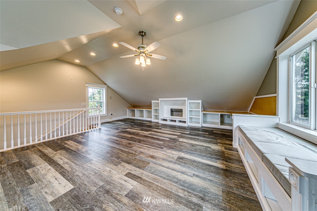 243 Griffith Farm Road Sequim, WA 98382 - Photo 16 of 35 a view of a bedroom with wooden floor