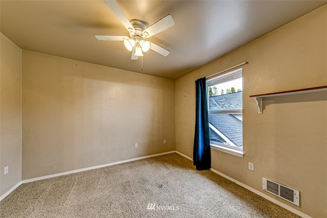 243 Griffith Farm Road Sequim, WA 98382 - Photo 21 of 35 an empty room with windows
