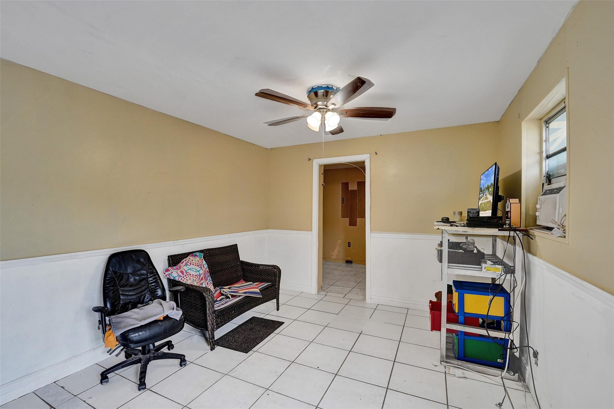 1960 Southwest 68th Way Miramar, FL 33023 - Photo 24 of 39 a living room with furniture