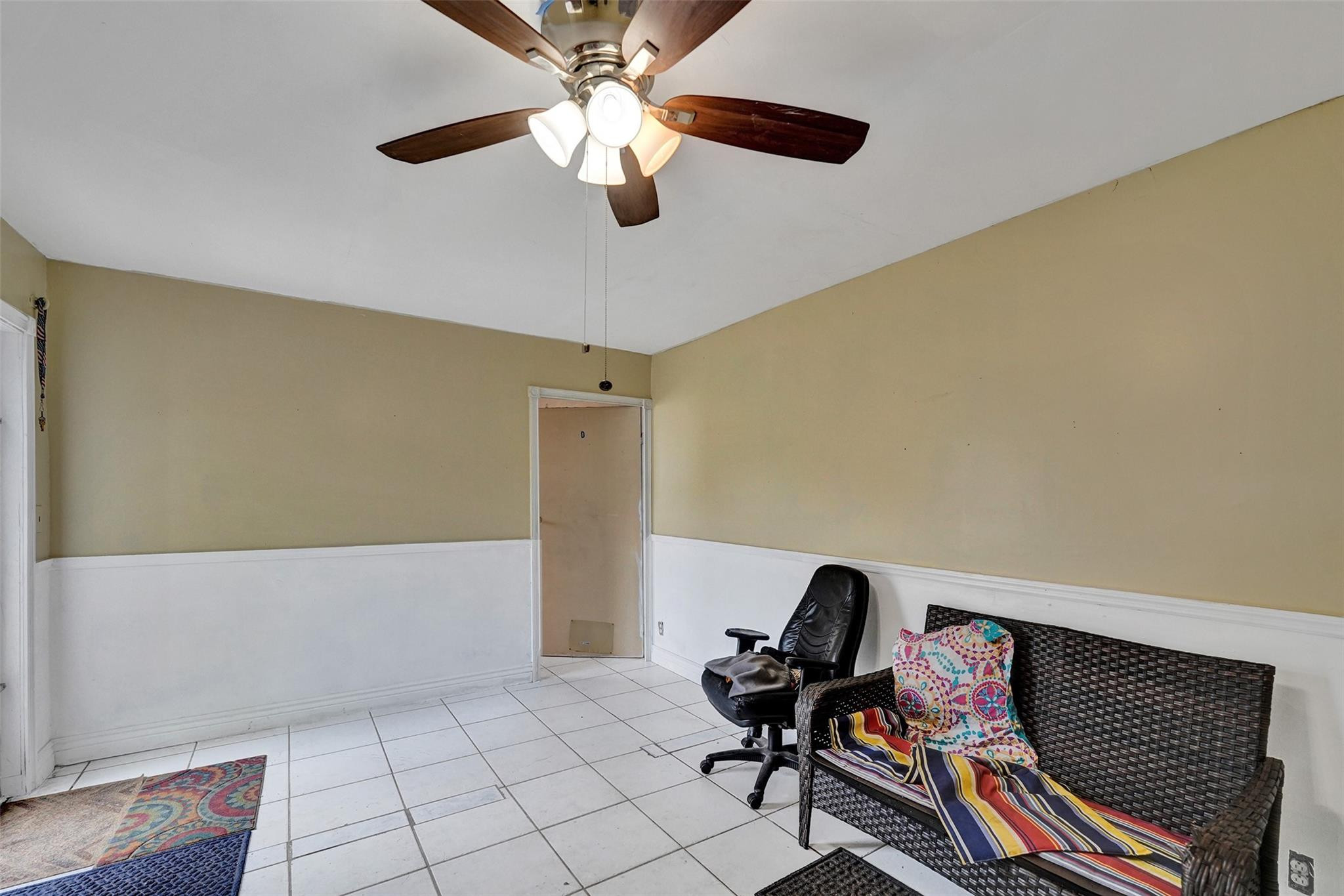 1960 Southwest 68th Way Miramar, FL 33023 - Photo 25 of 39 a workspace with a couch