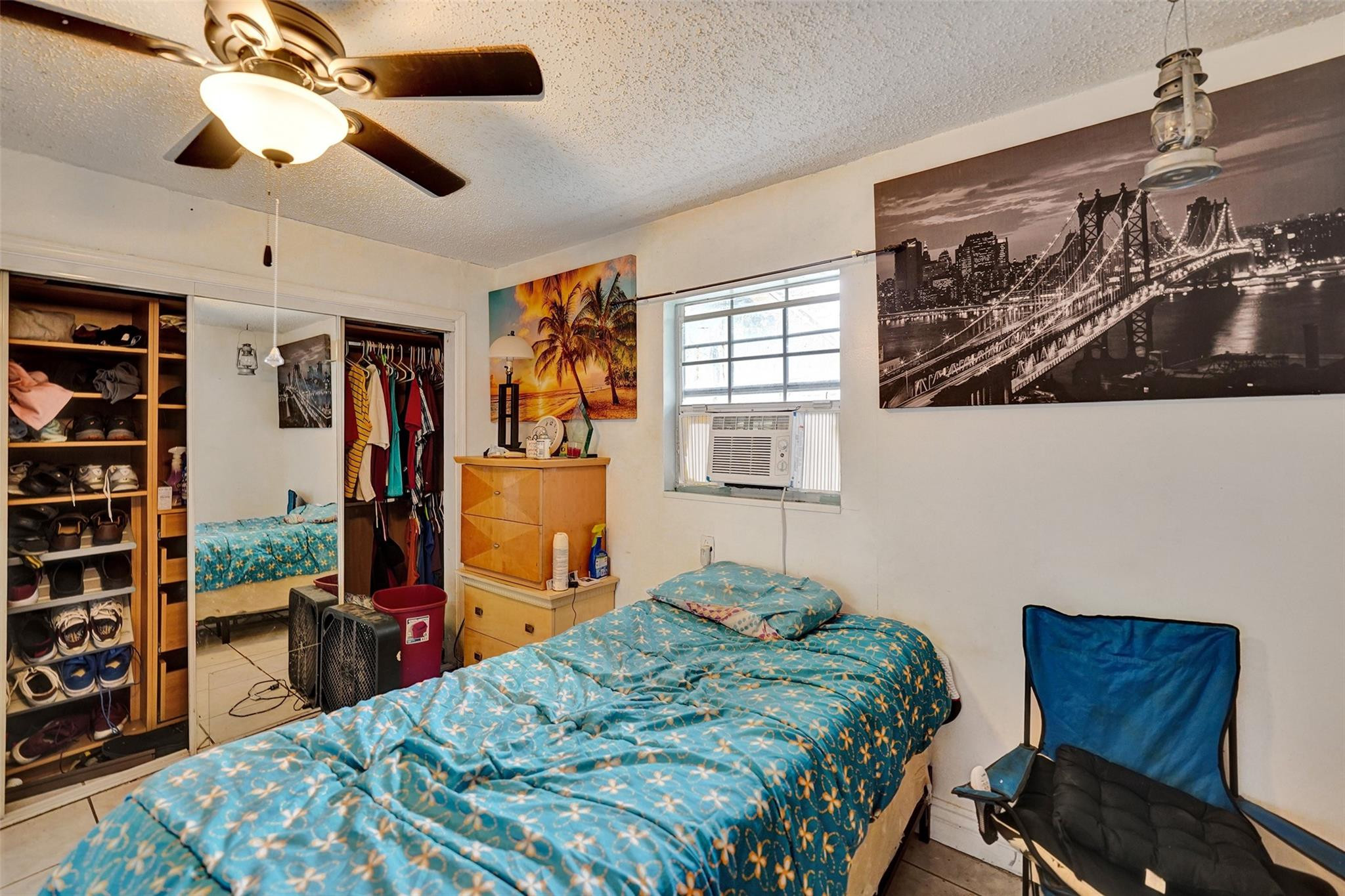 1960 Southwest 68th Way Miramar, FL 33023 - Photo 32 of 39 a bedroom that has a bed and a closet