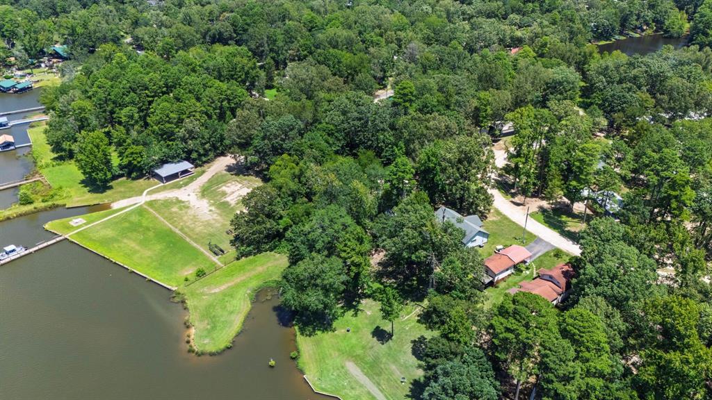 277 Private Road Pittsburg, TX 75686 - Photo 33 of 40 an aerial view of a house with a yard and swimming pool
