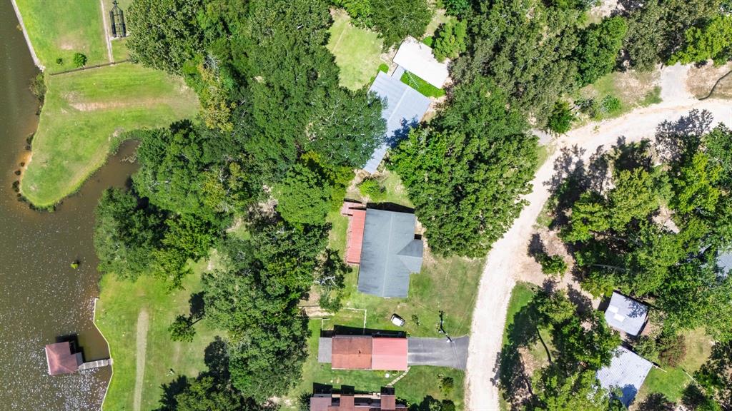 277 Private Road Pittsburg, TX 75686 - Photo 38 of 40 an aerial view of a house with a yard and garden
