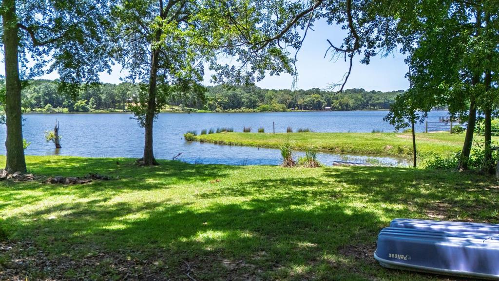 277 Private Road Pittsburg, TX 75686 - Photo 4 of 40 a view of a yard with an outdoor space