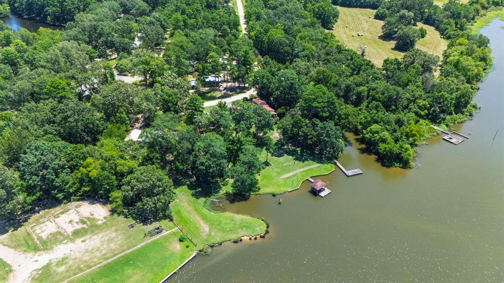 277 Private Road Pittsburg, TX 75686 - Photo 5 of 40 an aerial view of a house with a yard
