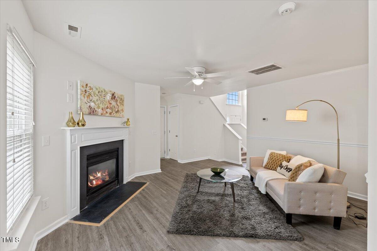 315 Inkster Cove Raleigh, NC 27603 - Photo 19 of 44 a living room with furniture and a fireplace