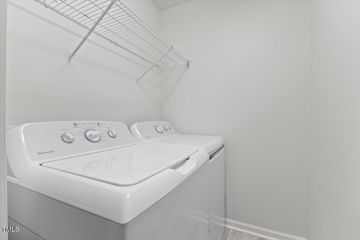 315 Inkster Cove Raleigh, NC 27603 - Photo 29 of 44 a utility room with dryer and washer