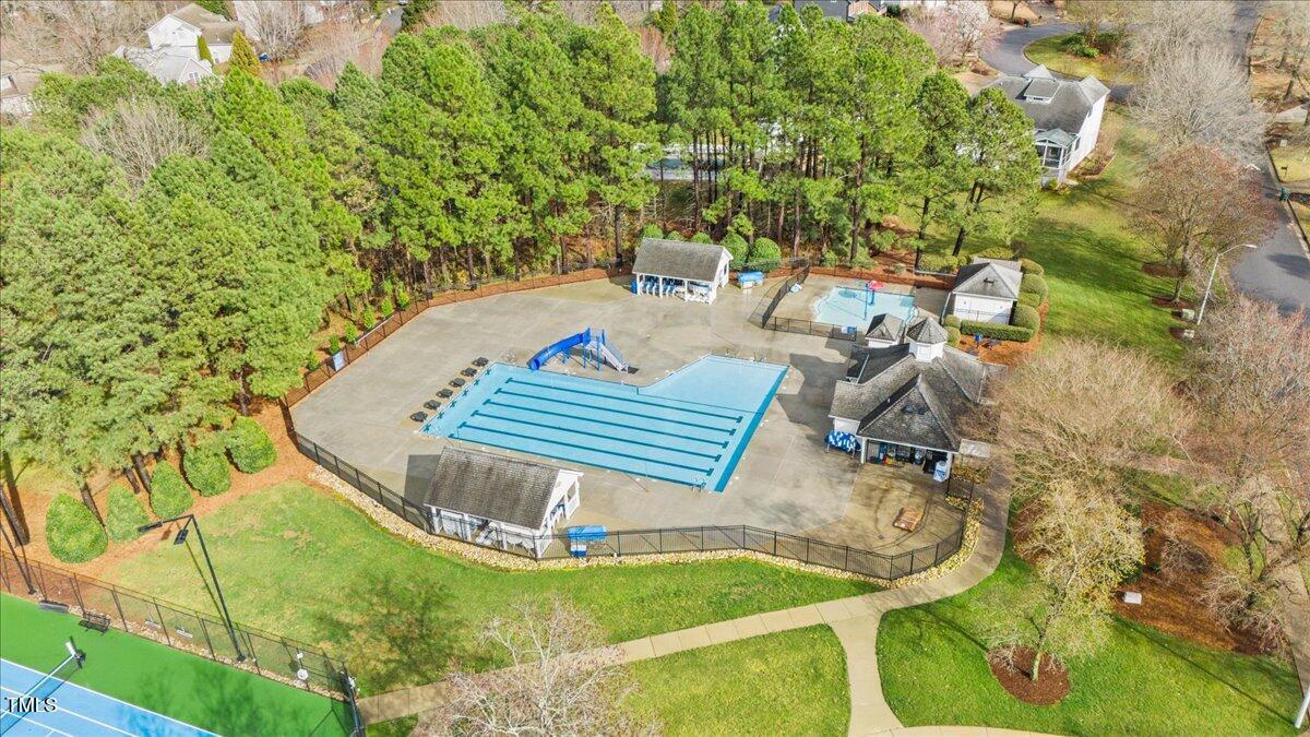 315 Inkster Cove Raleigh, NC 27603 - Photo 40 of 44 a view of a backyard with table and chairs