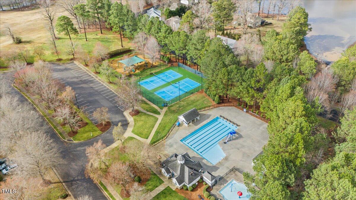 315 Inkster Cove Raleigh, NC 27603 - Photo 42 of 44 an aerial view of a house with a yard and trees