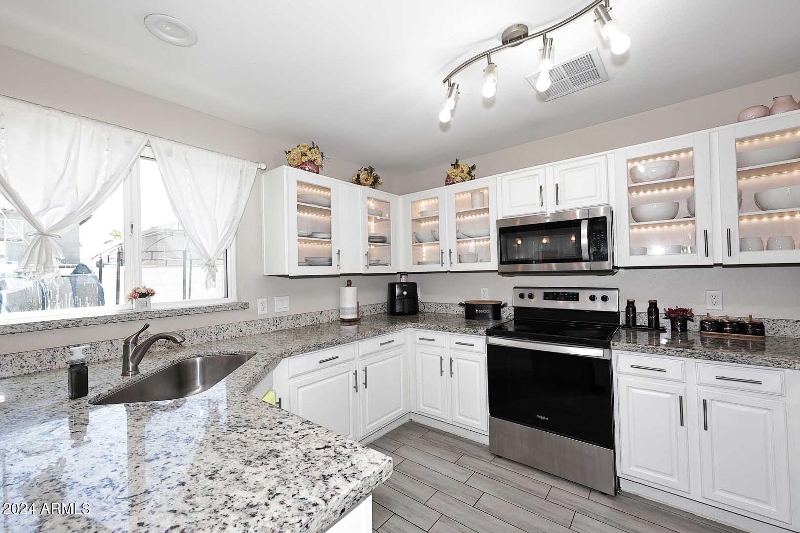 12225 West Larkspur Road El Mirage, AZ 85335 - Photo 13 of 43 Kitchen2