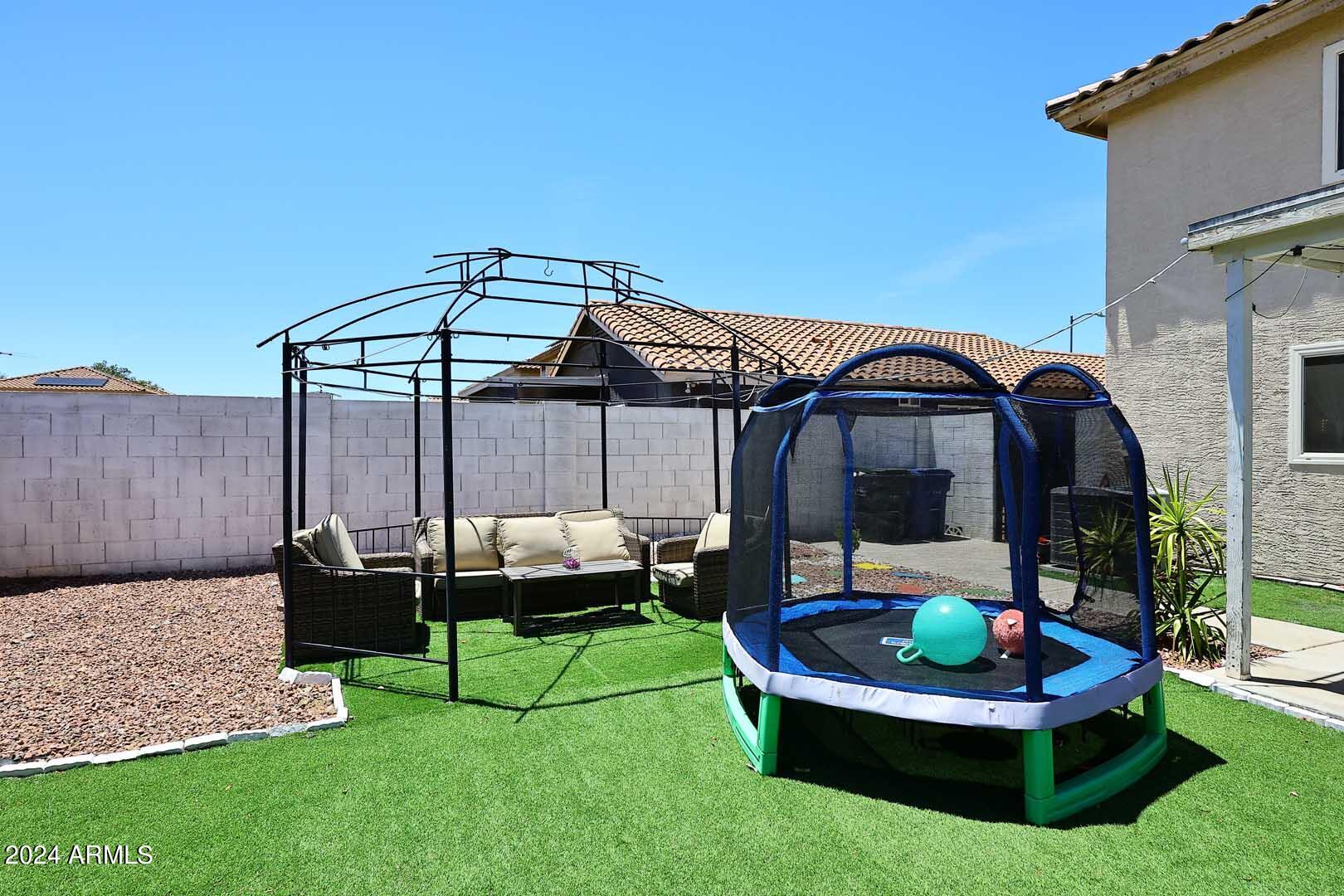 12225 West Larkspur Road El Mirage, AZ 85335 - Photo 39 of 43 Backyard-Pergola