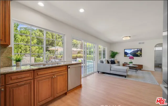 a view of swimming pool with a yard