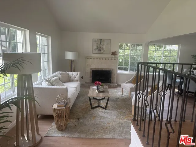 a view of livingroom with furniture and fireplace