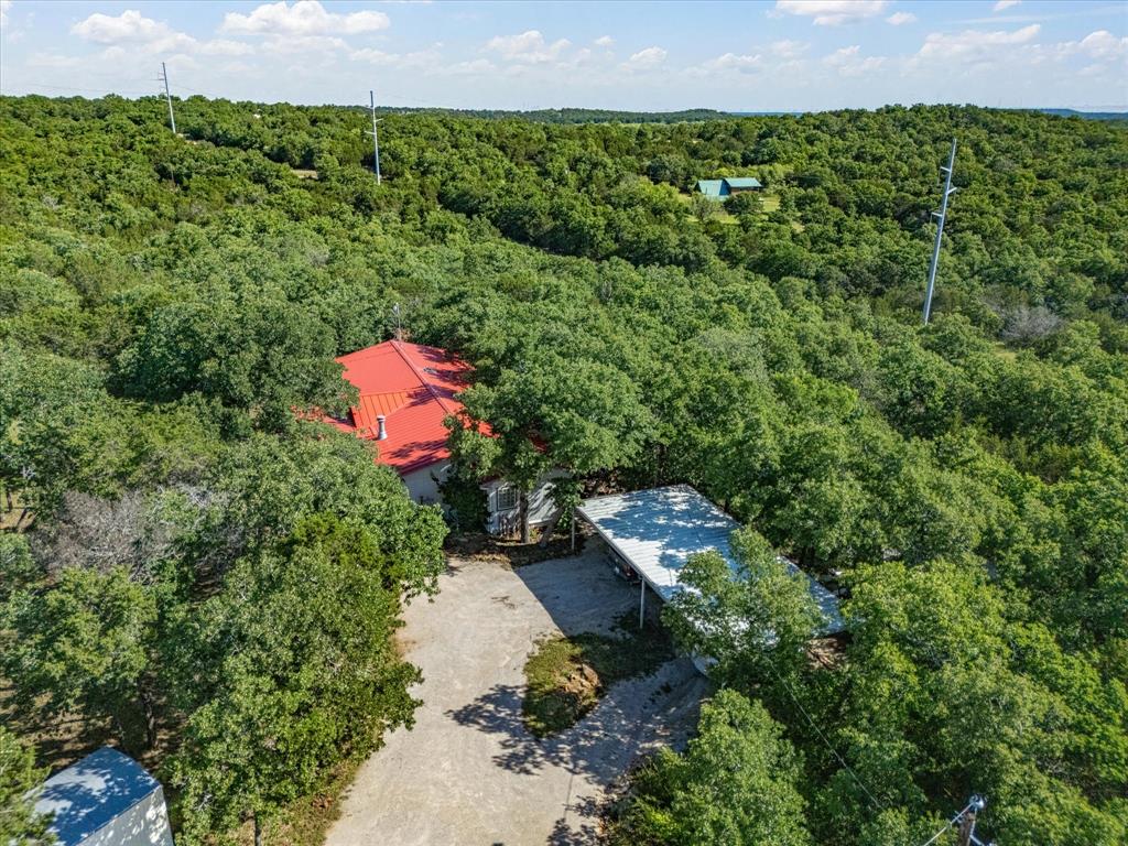 3275 Finis Road Graham, TX 76450 - Photo 34 of 36 an aerial view of a house with a yard