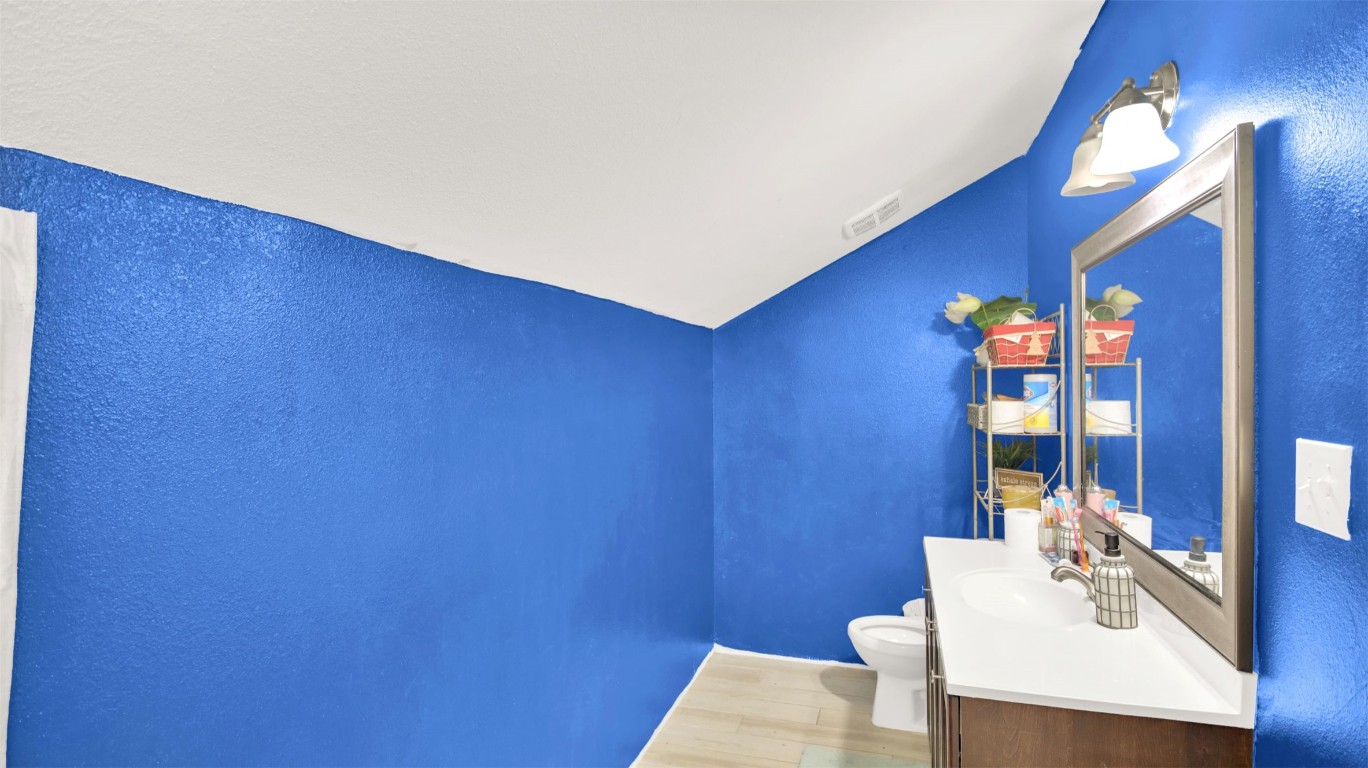 120 Rio Vista Ranch Road Dale, TX 78616 - Photo 17 of 22 a bathroom with a sink vanity and a mirror