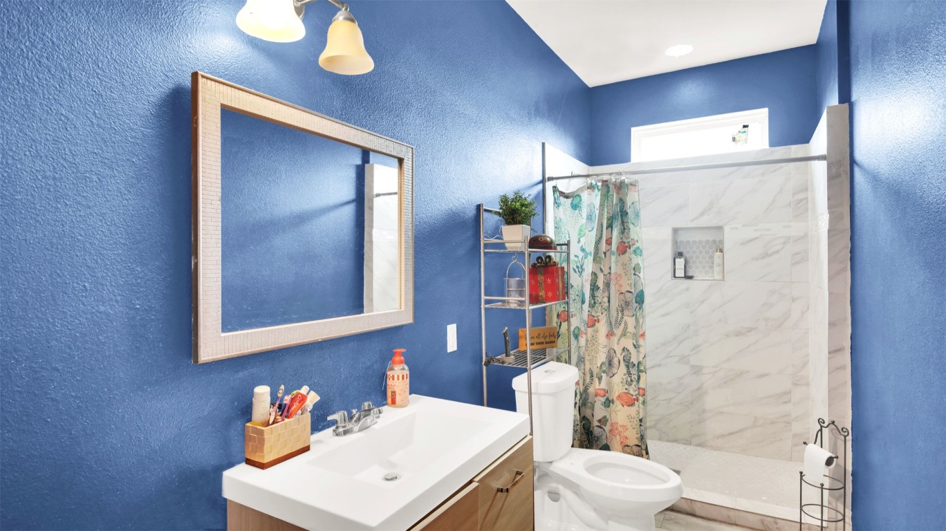 120 Rio Vista Ranch Road Dale, TX 78616 - Photo 18 of 22 a bathroom with a sink toilet and shower
