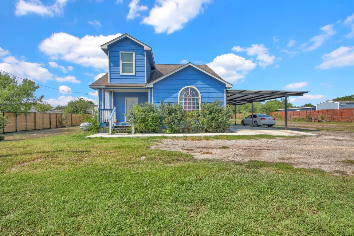 120 Rio Vista Ranch Road Dale, TX 78616 - Photo 2 of 22 a view of a house with a big yard