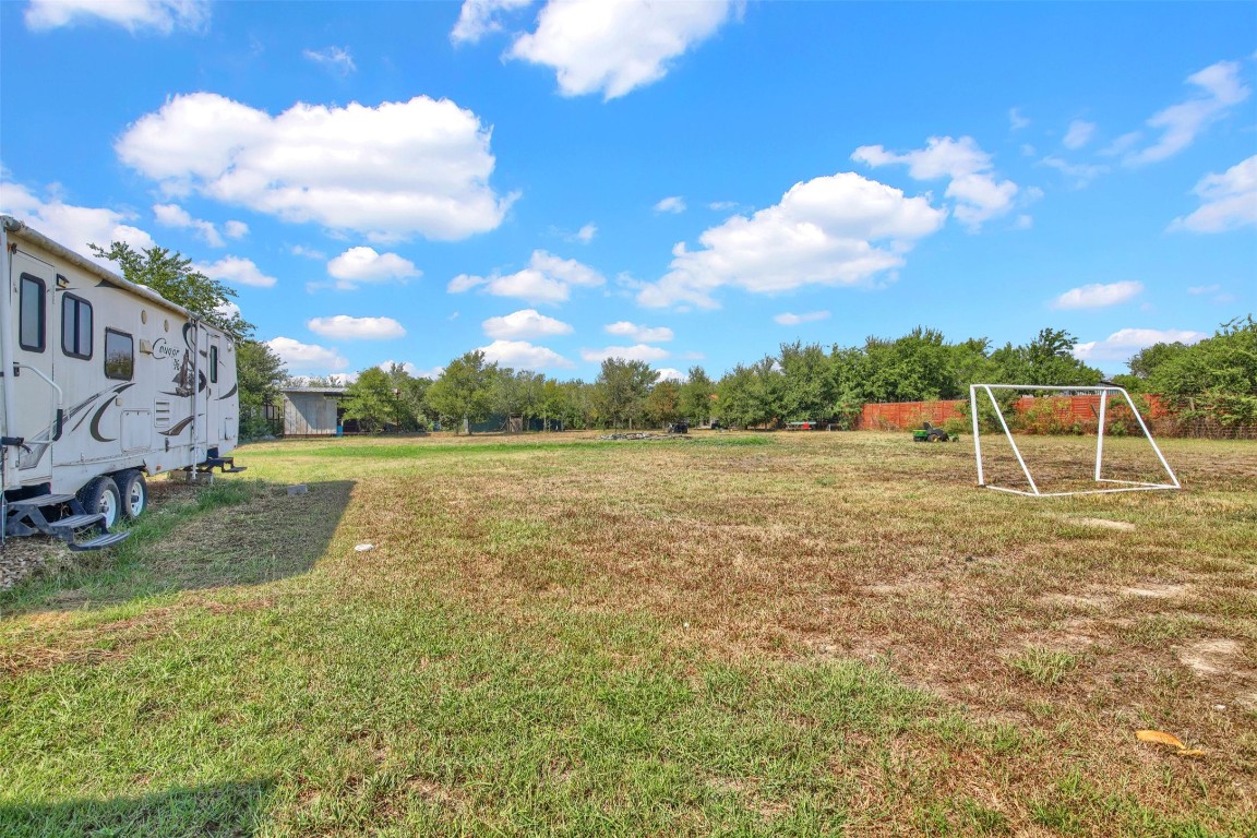 120 Rio Vista Ranch Road Dale, TX 78616 - Photo 21 of 22 a view of a garden with a house