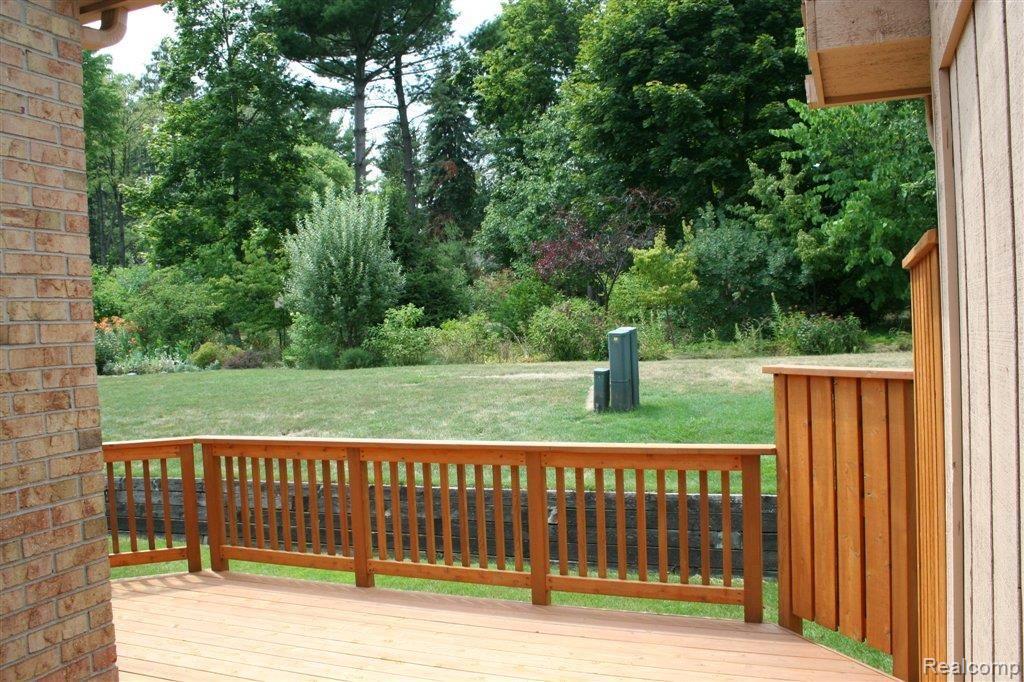 22055 River Ridge Trail, Unit 42 Farmington, MI 48335 - Photo 23 of 25 View to the woods!