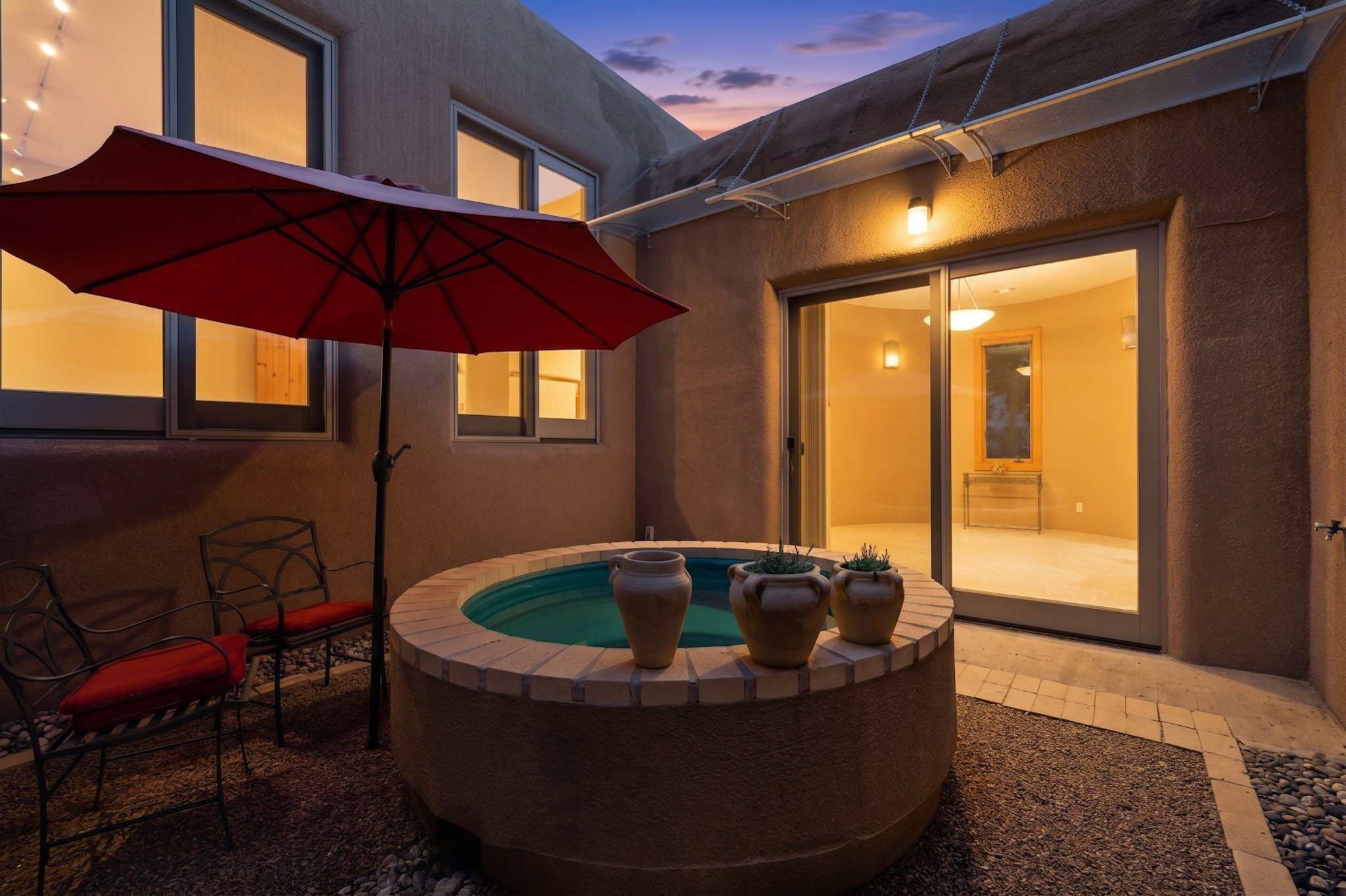 1404 Tesuque Creek Road Santa Fe, NM 87501 - Photo 48 of 55 Raised pond or planter in courtyard off the kitchen