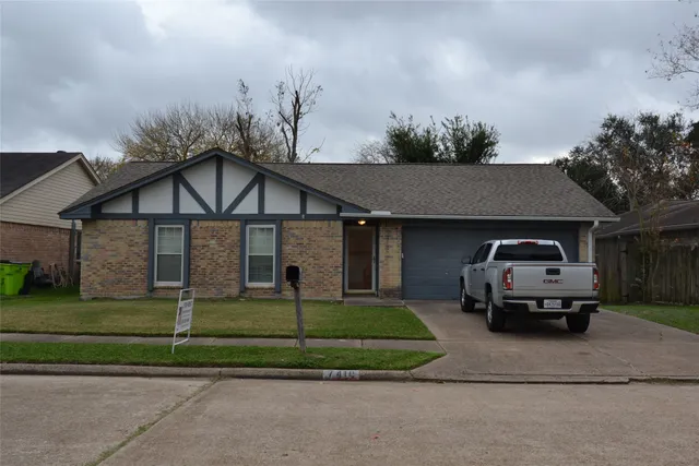 a car parked in front of a house