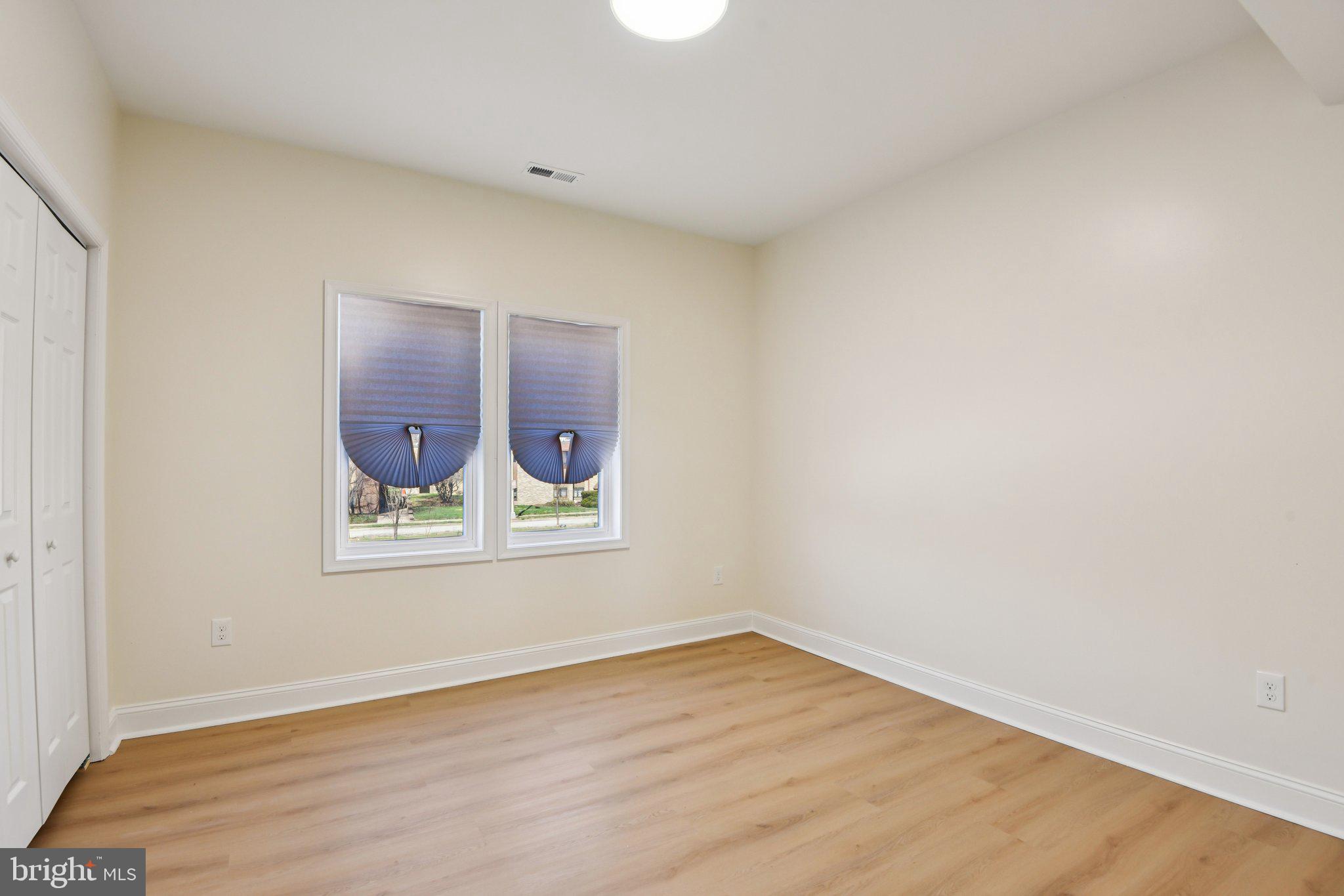 2223 Roslyn Avenue Baltimore, MD 21216 - Photo 18 of 32 an empty room with a window