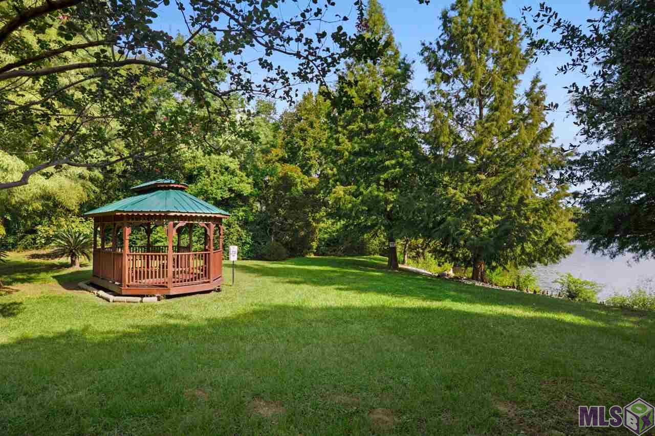 2933 Magazine Drive Baton Rouge, LA 70816 - Photo 4 of 16 Maison Deville Gazebo next to lake