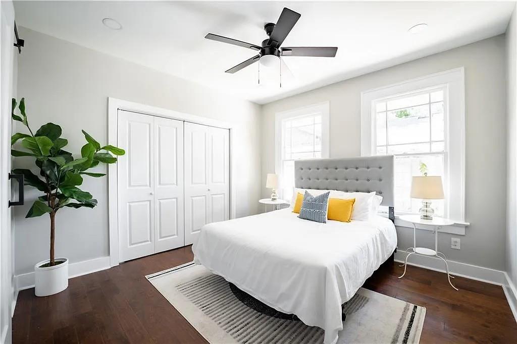 943 Rose Circle Southwest Atlanta, GA 30310 - Photo 16 of 33 a bedroom with a bed and a potted plant