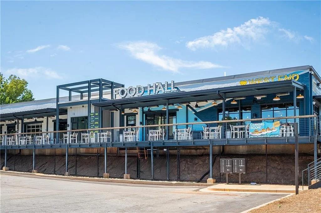 943 Rose Circle Southwest Atlanta, GA 30310 - Photo 32 of 33 a front view of a house with balcony