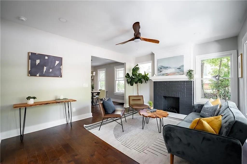 943 Rose Circle Southwest Atlanta, GA 30310 - Photo 5 of 33 a living room with furniture and a fireplace