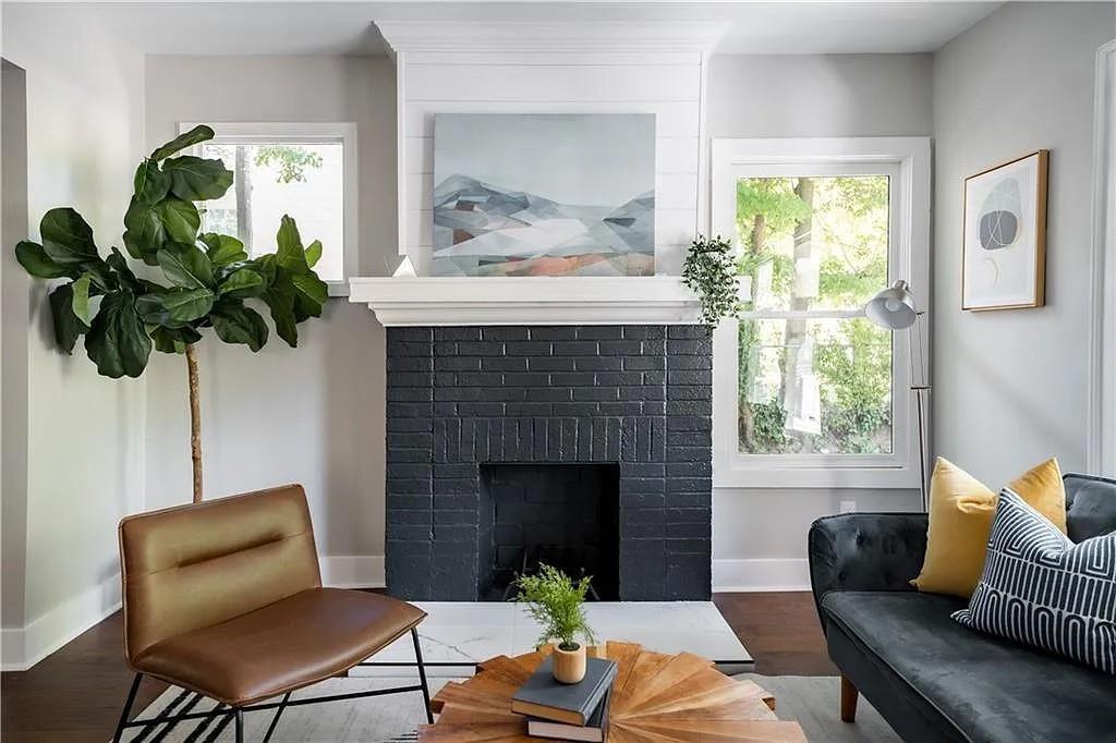 943 Rose Circle Southwest Atlanta, GA 30310 - Photo 7 of 33 a living room with furniture fireplace and window