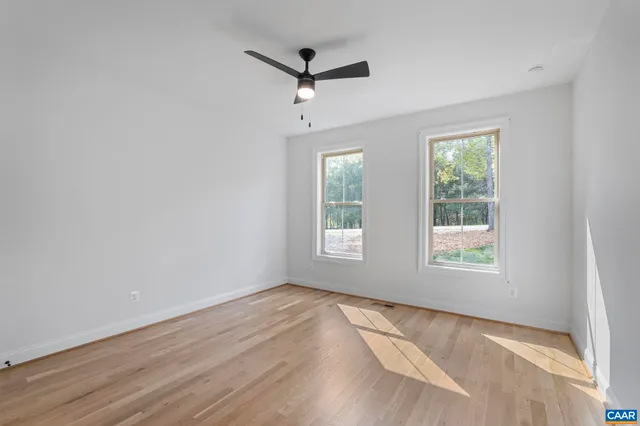 a view of a backyard of the house