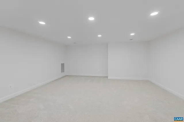 an aerial view of a house with swimming pool