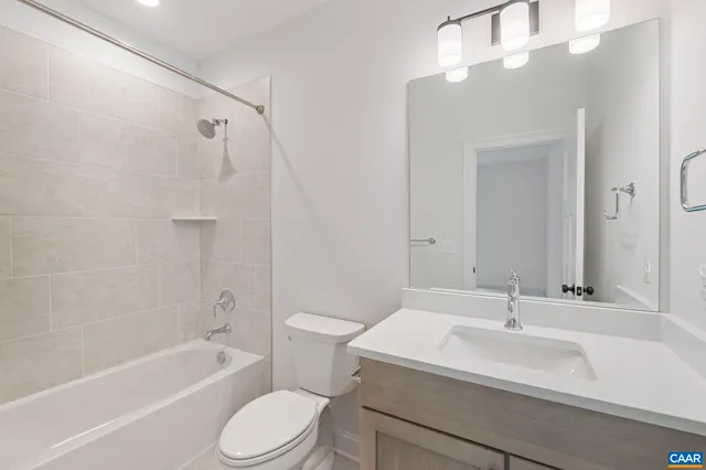 a view of a room with wooden walls