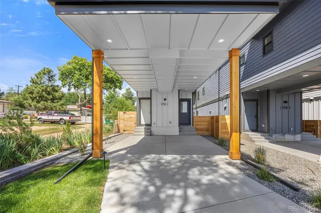 a view of a living room and front door