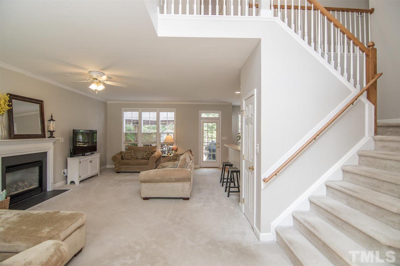 1906 Patterson Grove Road Apex, NC 27502 - Photo 3 of 27 Foyer Opens to Large Family Room